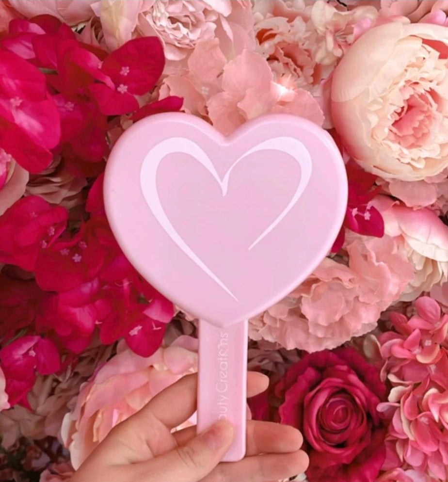 HANDHELD MIRROR